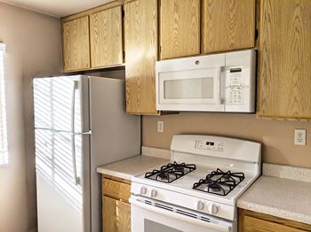 White ge refrigerator with icemaker*